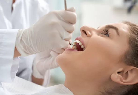 Patient undergoing dental exam